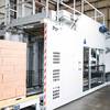 conventional-palletizer-APH-5480-video-1-splashimage Conventional palletizer for boxes - lateral view