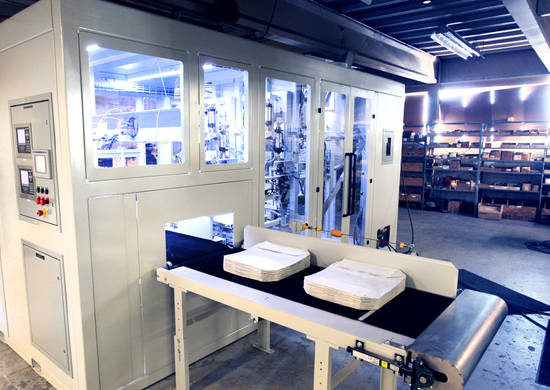 valve-bag-filler-Encompass-video-1_splashimage Emcompass valve bag filler - bags on conveyor