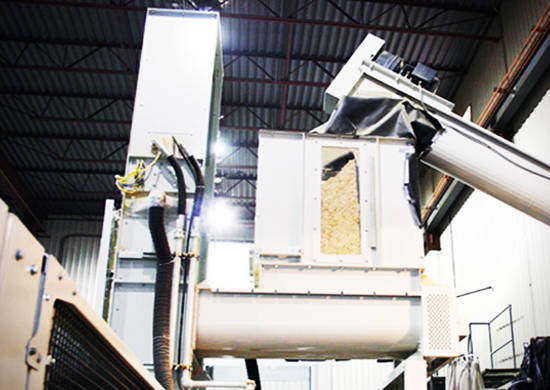 Feeder for wood shavings baler Feeder for wood shavings baler