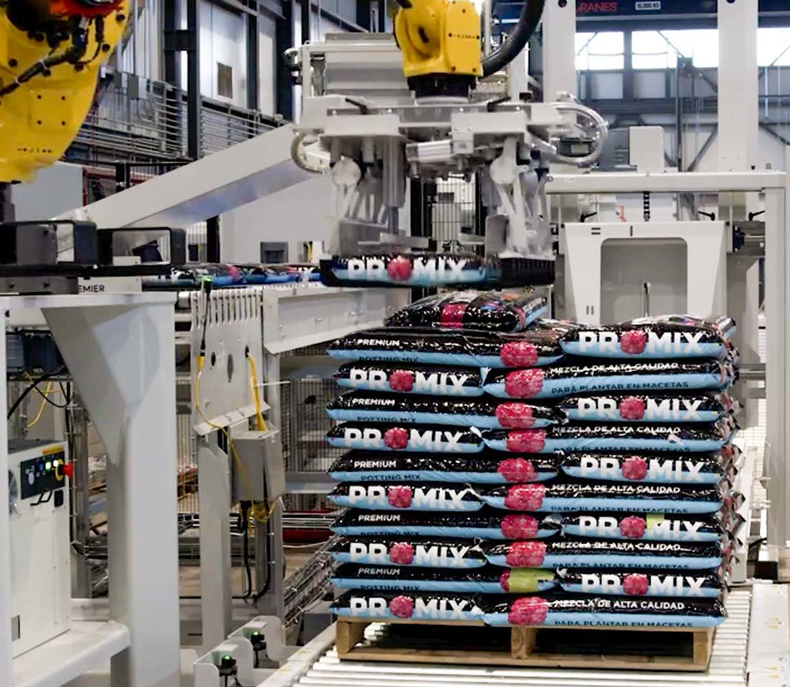 Robotic bag palletizer stacking bags on pallet